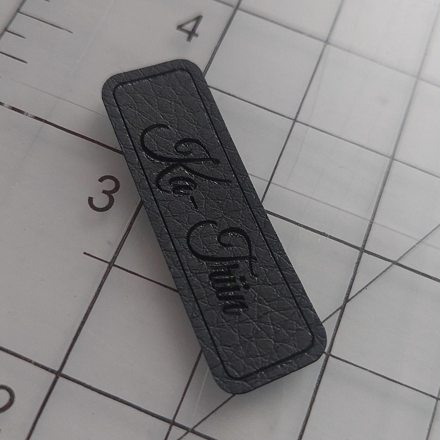 Must kunstnahast eritellimus silt oma logo või kujundusega