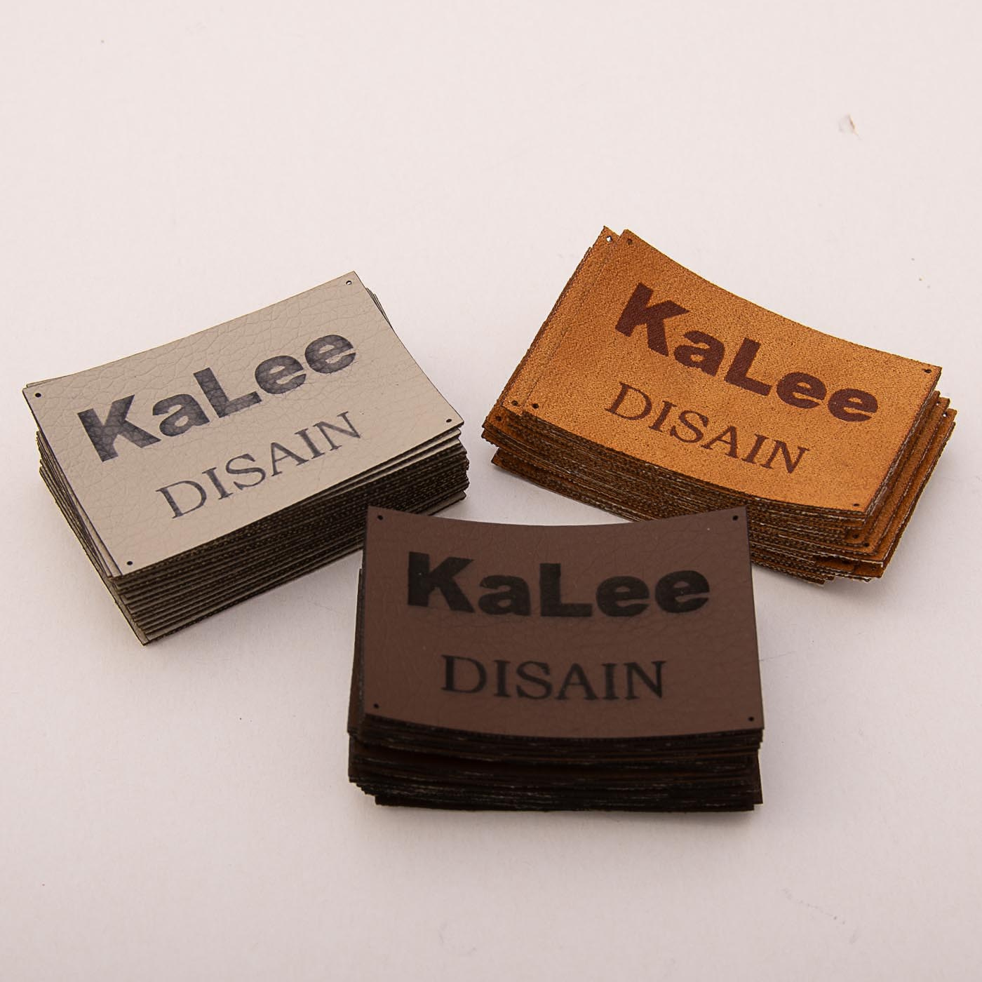 Beež kunstnahast eritellimus silt oma logo või kujundusega