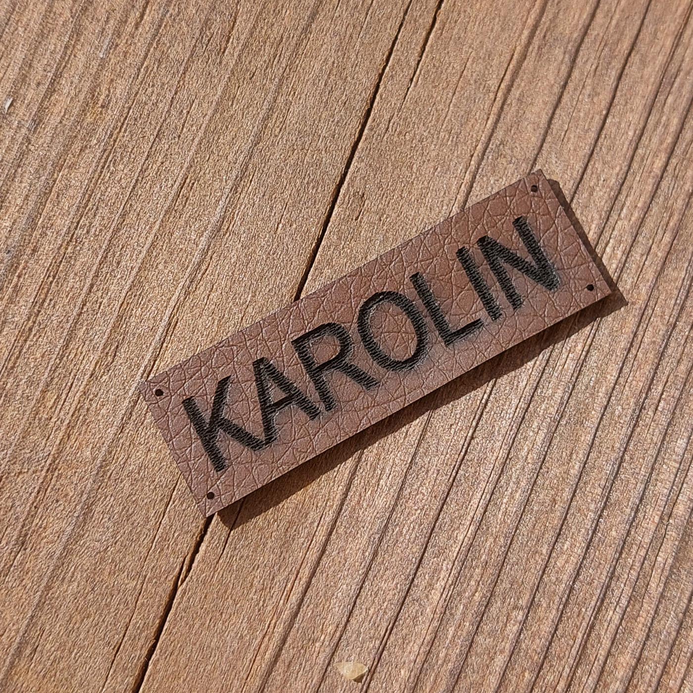 Tumepruunist kunstnahast eritellimus silt oma logo või kujundusega